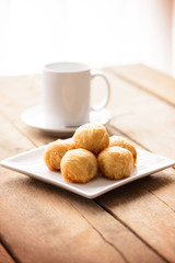Chinese pastry moon cake with cup of tea