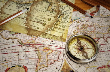 Naklejka na ściany i meble Vintage map and vintage compass
