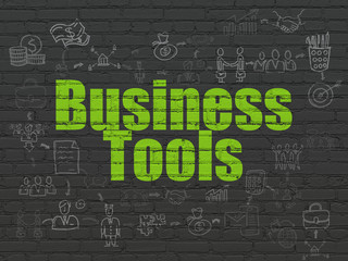 Finance concept: Business Tools on wall background