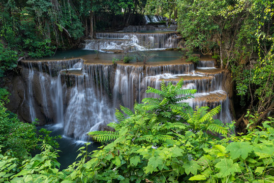 Fototapeta Deep forest waterfall, Huay Mae Kamin waterfall in Kanchanaburi, Thailand  