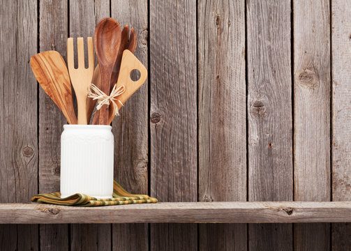 Kitchen utensils on shelf