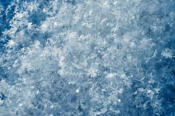 Fototapeta na wymiar Snowflakes background macro