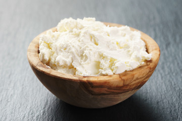 soft cheese like ricotta in bowl
