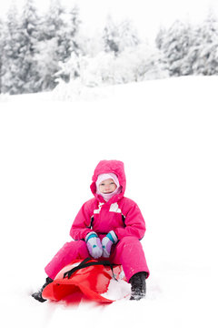 sledding little girl