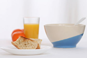 close up of a breakfast with toast and orange juice full of vitamins
