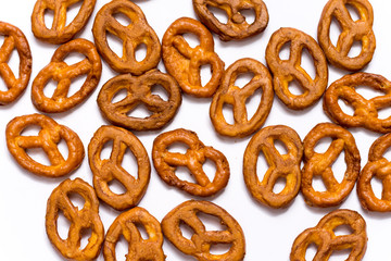 Pile of pretzels on a white surface