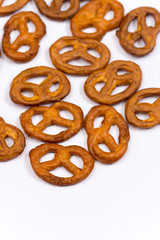 Pile of pretzels on a white surface