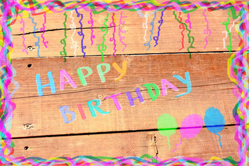 Birthday card with colorful curling ribbons and balloons