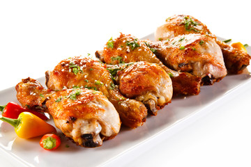 Roast chicken drumsticks and vegetables