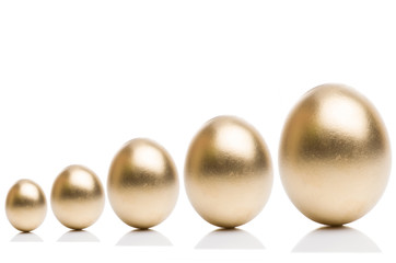 Golden eggs from  isolated on a white background. 