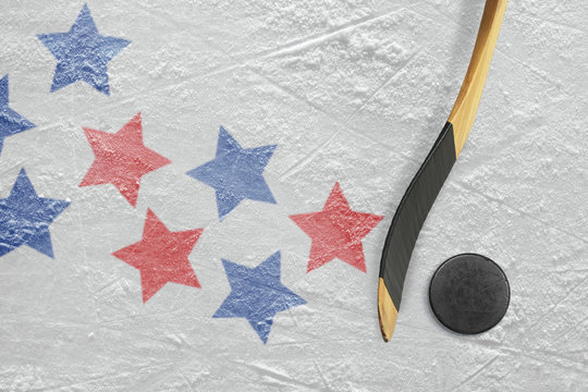 Hockey puck, stick and star