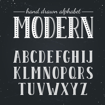 Hand drawn alphabet. Uppercase letters and symbols on chalkboard. Handdrawn typography. Modern font.