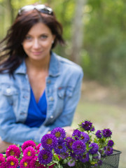 posing with flowers