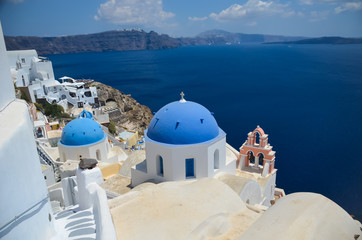 Fototapeta na wymiar dreamlike trip to the island of Santorini July 17, 2014: At this time the beautiful weather and landscapes