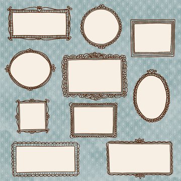 Hand drawn doodle picture frames on wallpaper