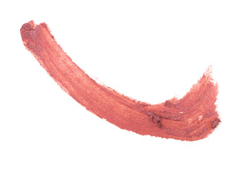 Red color lipstick stroke on white paper