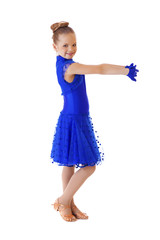 Happy little girl in blue dancing dress