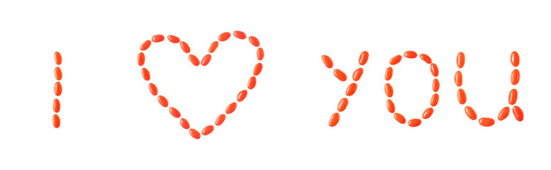 &laquo;I love you&raquo; lettering made of red candies isolated on white background