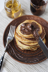 Pancakes with chocolate and honey