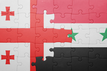 puzzle with the national flag of georgia and syria