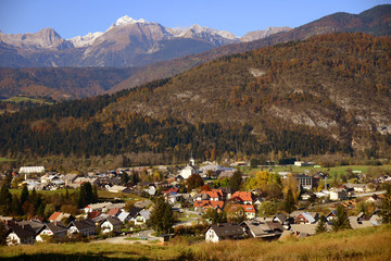 Fototapeta na wymiar Bohinjska Bistrica with the highest mountain in Slovenia, Triglav