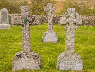 Ancient stone crosses in churchyard, Isle of Mull, Scotland, UK