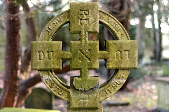 DUX LUX REX LEX Cross. Engraved with "My Leader, My Light, My King, My Law" in Bath, UK. The inscription of "Jesu esto mihi Jesus" translates as "O Jesus, be to me my Saviour / Healer"
