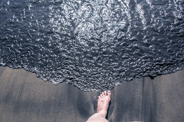 my feet waiting for the water to come in