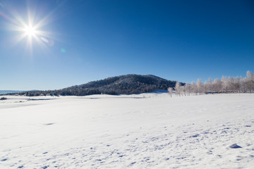 Winter Landscape with Sunshine