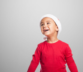 portrait of a happy little boy waiting for christmas eve