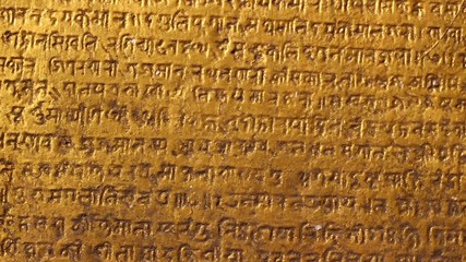 An ancient manuscript. Zoom in. Extreme close up.