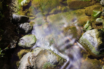 Fototapeta na wymiar Rocks in a stream