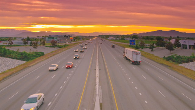 Time-lapse shot of traffic on a highway in Utah taken from an overpass