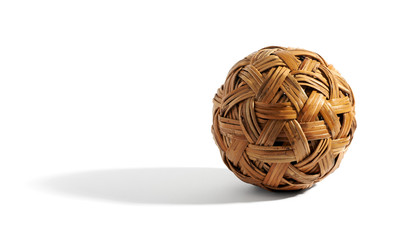 Cute little wicker ball on white background