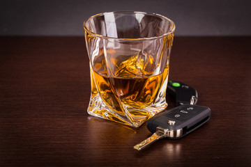 Car keys and alcoholic drink