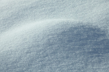 Naklejka premium Big snowdrift at mountains at winter day