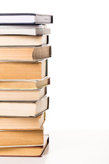 Pile of books on white background