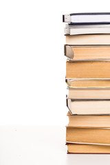 Pile of books on white background