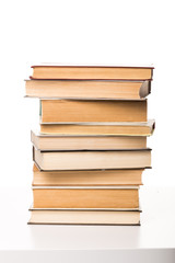 Pile of books on white background