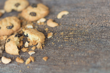 homemade oatmeal cookies with cashew on old Cracked Wood Backgro