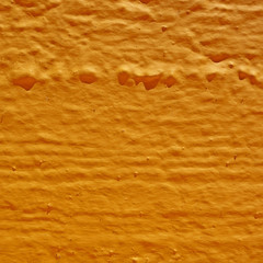 vibrant orange rough surface close-up