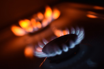 Red gas flame of a burning stove
