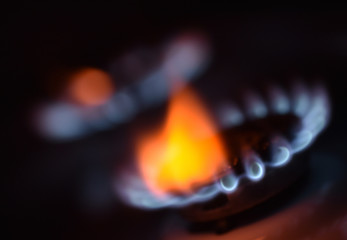 Red gas flame of a burning stove
