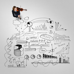 Naklejka premium Businesswoman playing violin