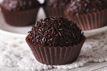 Delicious chocolate candy Brigadeiro macro. horizontal
