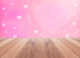 Valentine heart shaped lights background and wooden table 