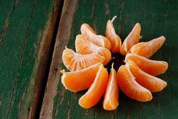 Orange mandarin divided to pieces
