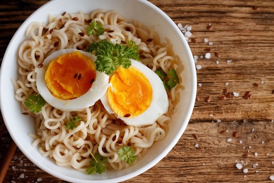Chinese soup with eggs and parsley