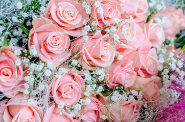 Bouquet of pink roses with small briliants