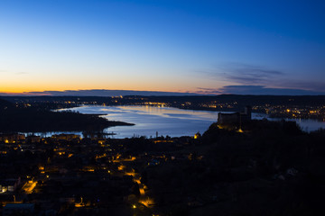 Fototapeta premium beautiful sunshine on the major lake with castle of borromeo
